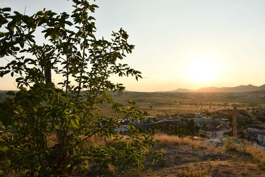 View of the village Cavusin in Cappadocia, Turkey on sunset