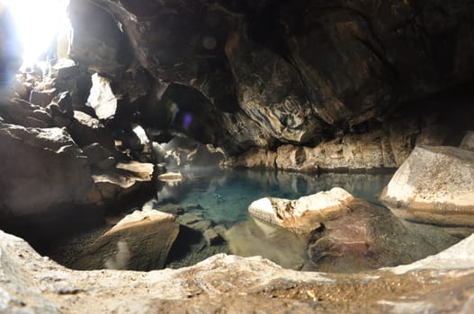 Scenic view of Grjotagja cave and its hot spring in Iceland