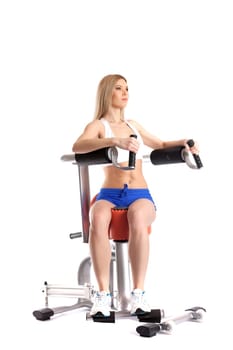 Sporty woman exercising on modern hydraulic simulator