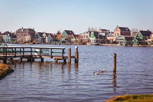 Amsterdam, a village in Zaanse Schans with residences near to the Zaan River