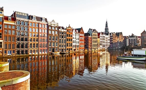 Old buildings along the river in Amsterdam's city center, travel reportage