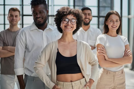 Face of beautiful woman on the background of business people