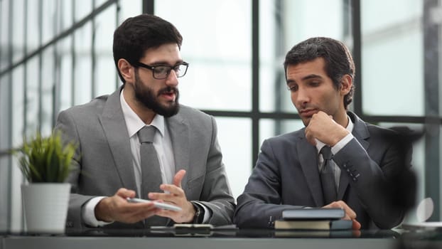 business people in the office working together.