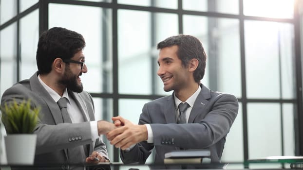 young successful managers at the table in the office.