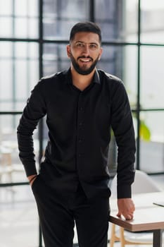 portrait of a young businessman who is smiling