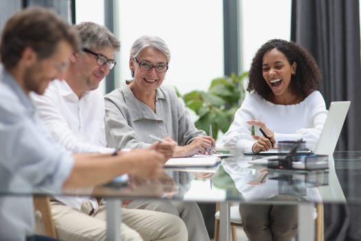 Conversation between managers and employees in the office