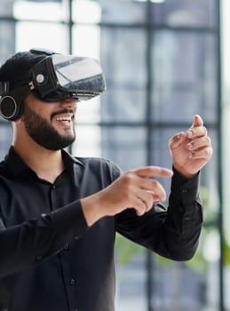 Businessman with virtual reality headset at office