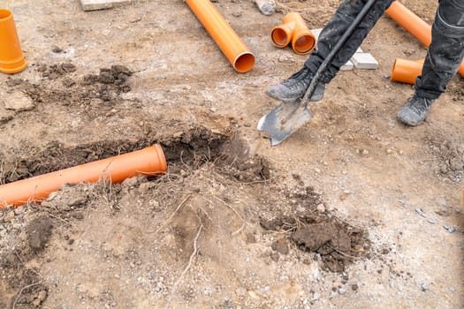 plastic pvc waste sewer pipe in the ground. High quality photo