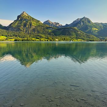Wolfgangsee lake in summer. Beautiful Austrian landscape with lake and mountains in the Alps.