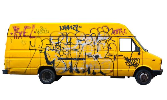 Yellow van covered in graffiti isolated on white background