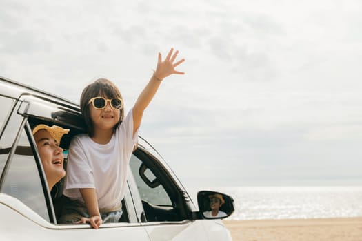 Summer at beach. Father, mother and child smiling having fun sitting in compact white car windows raise hand wave bye bye, Car insurance, Family holiday vacation travel, car travel, Happy family day