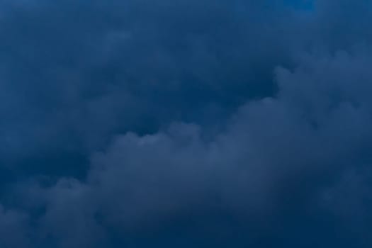 Dark blue clouds sky rain clouds bad weather nature background.