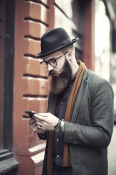 Young male hipster looking at smartphones at city, AI Generative,