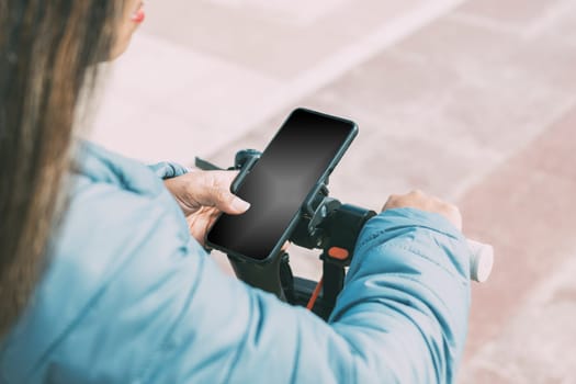 beautiful latina woman, middle age 40-50 years old, long hair, uses smart phone application to unlock electric scooter, screen, for apps.
