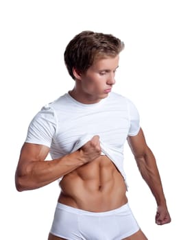 Portrait of athletic muscular man in white t-shirt, isolated on white