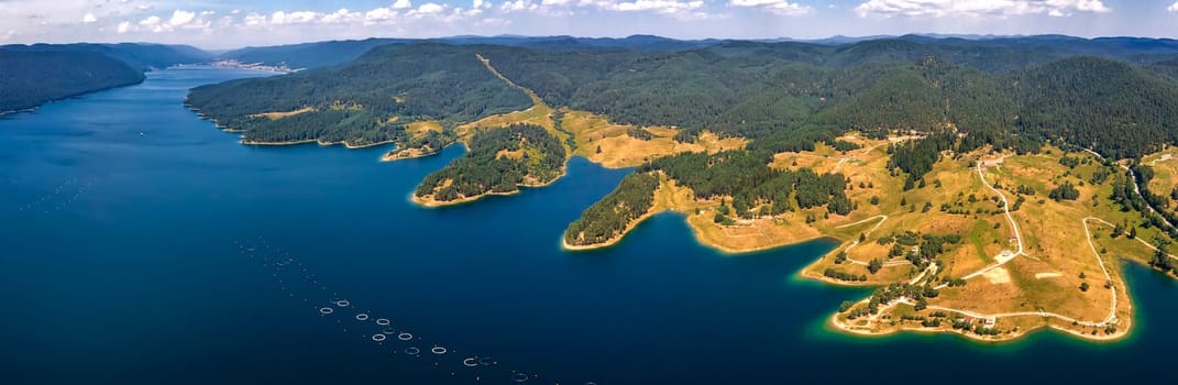 Stunning aerial panorama view of the lake coastline, Dospat, Bulgaria