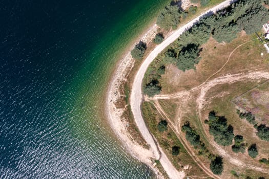 Stunning aerial panorama view of the lake coastline