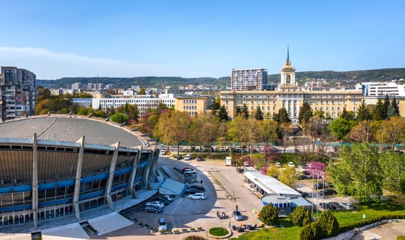 Varna, Bulgaria - April 25, 2022: Aerial view from drone to Palace of Culture and Sports and  Nikola Vaptsarov Naval Academy