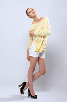 Smiling young model posing in casual clothes, close-up
