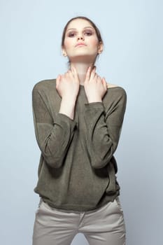 Attractive model posing in modern casual clothes, close-up