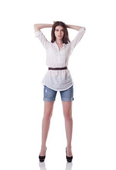 Image of tall brunette posing in casual clothes, isolated on white