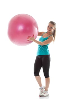 Funny girl posing in sportswear with pink ball, isolated on white background