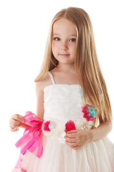 Cute little girl posing in beautiful pink dress, close-up