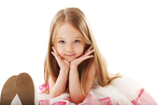 Portrait of little smiling girl looking at camera, close-up