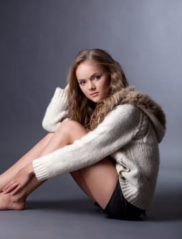 Smiling beautiful girl posing in casual clothes, close-up