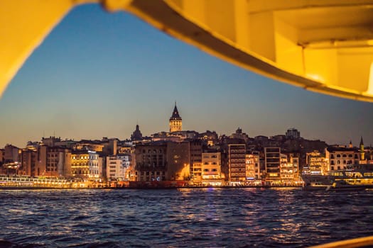 Istanbul city skyline in Turkey, Beyoglu district old houses with Galata tower on top, view from the Golden Horn.