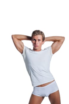 Beefy guy advertises underwear, isolated on white background