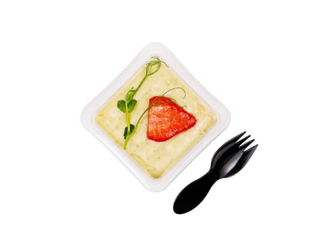 Sweet dessert of cream, jam, muesli and strawberries on a white background. High quality photo