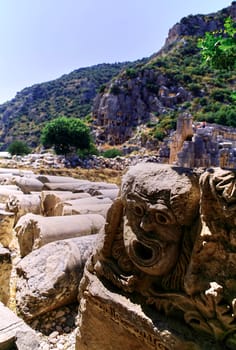 Stone Theater masks in Myra Ancient City. Demre, Antalya, Turkey