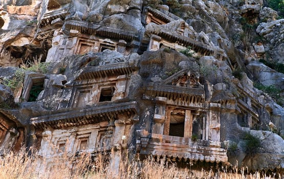 Koycegiz, Mugla, Turkey - July 12 2017: The rock tombs of the kings in the ancient city of Kaunos in Koycegiz Dalyan