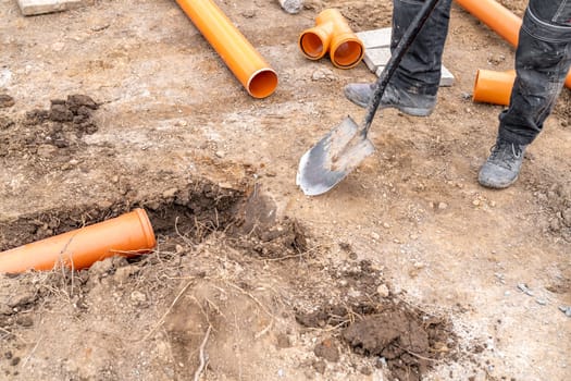 plastic pvc waste sewer pipe in the ground. High quality photo