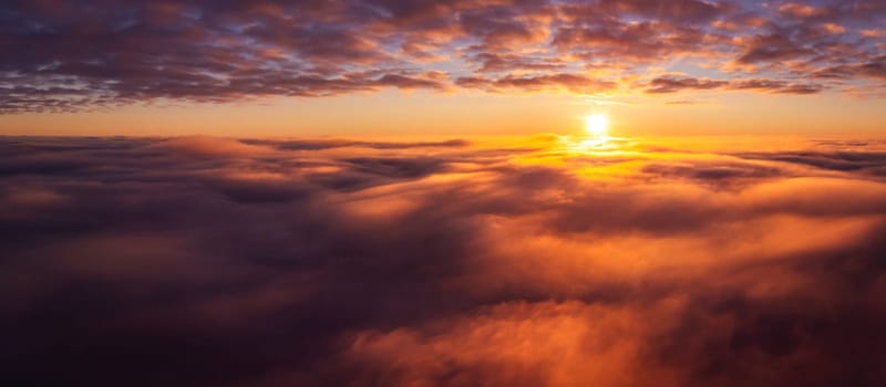 Aerial drone photo high above the clouds