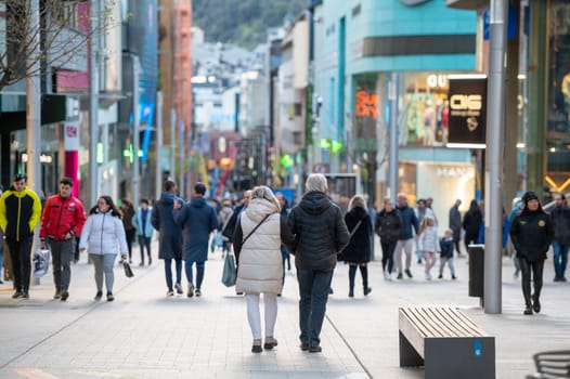 Andorra La Vella, Andorra : 2023 Aprill 15 : People Walk in the Comercial Street named Meritxell. Andorra la Vella, Andorra in winter.