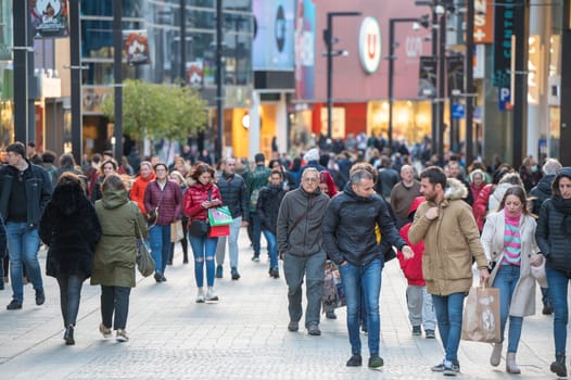 Andorra La Vella, Andorra : 2023 Aprill 15 : People Walk in the Comercial Street named Meritxell. Andorra la Vella, Andorra in winter.