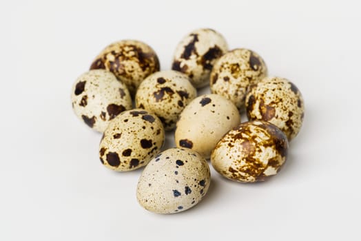 Quail eggs are isolated on a white background. small eggs. eco healthy food concept