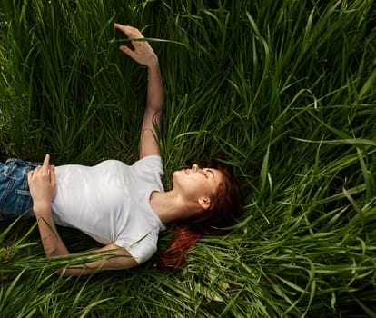 woman resting in the grass. High quality photo