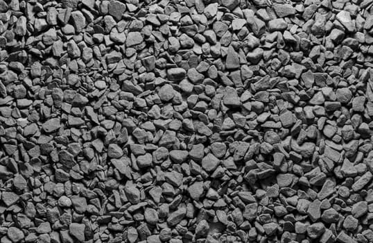 Pebbles sand black and white coffee texture in macro