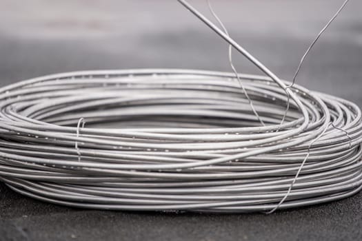 Thick aluminum wire for grounding buildings. Grounding wire to protect the building structure from short circuit