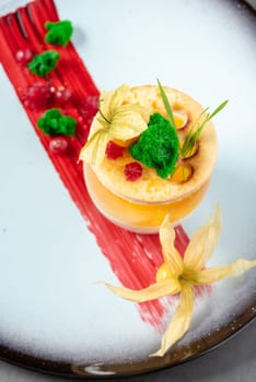 Panna cotta on stone table in fine dining restaurant