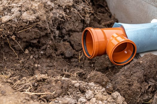plastic pvc waste sewer pipe in the ground. High quality photo