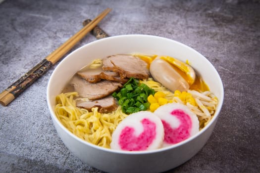 Fresh ramen noodles with garnish, pork tenderloin, eggs marinated in Mirin and soy sauce, bean sprouts, corn, nori leaf, spring onion, and homemade Narutomaki with codfish back, Hight quality