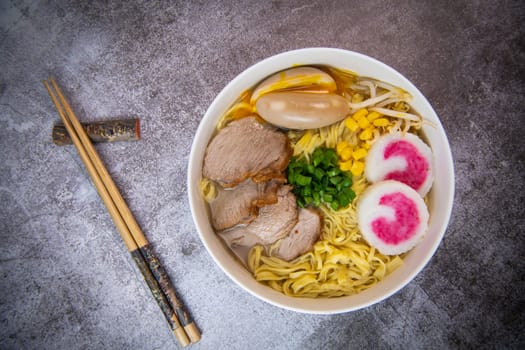 Fresh ramen noodles with garnish, pork tenderloin, eggs marinated in Mirin and soy sauce, bean sprouts, corn, nori leaf, spring onion, and homemade Narutomaki with codfish back, Hight quality
