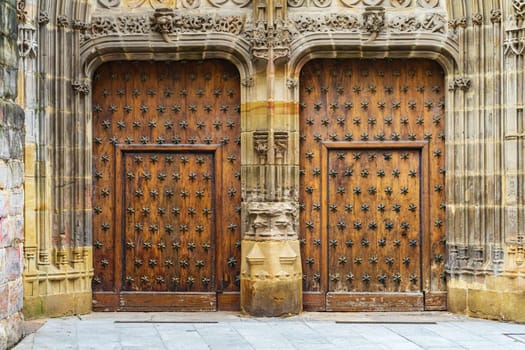 Old wooden doors Cathedral of Santiago, Bilbao, Spain