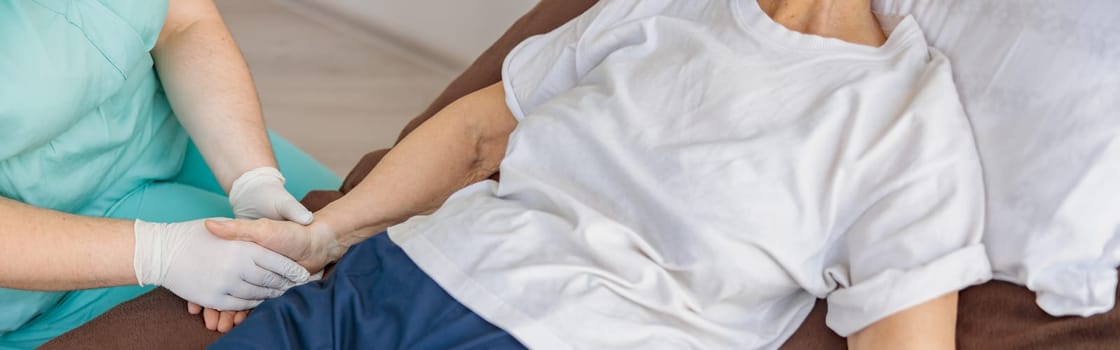 Professional Nurse controls drip of her patient in modern medicine clinic. High quality photo