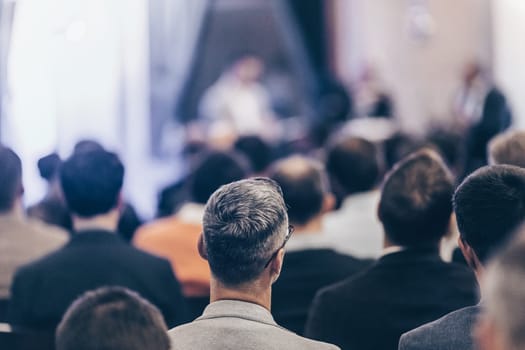 Round table discussion at business convention and Presentation. Audience at the conference hall. Business and entrepreneurship symposium.