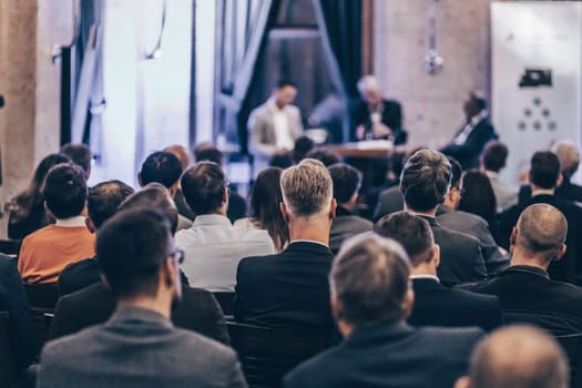 Round table discussion at business convention and Presentation. Audience at the conference hall. Business and entrepreneurship symposium.